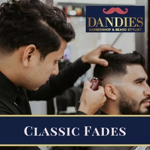 Teen boy getting a clean fade haircut at Dandies Barbershop in Campbell