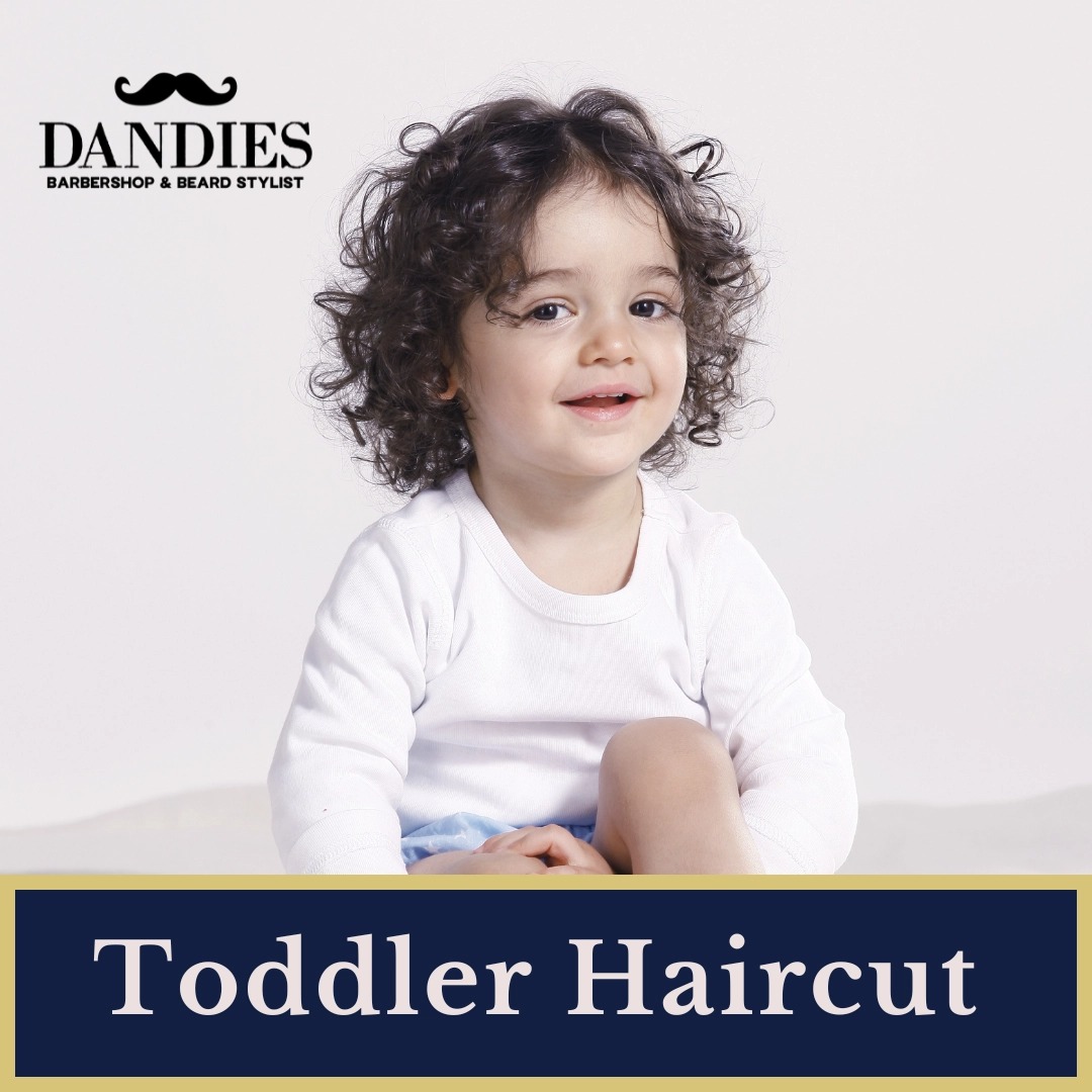 Toddler getting a haircut at Dandies Barber in Campbell