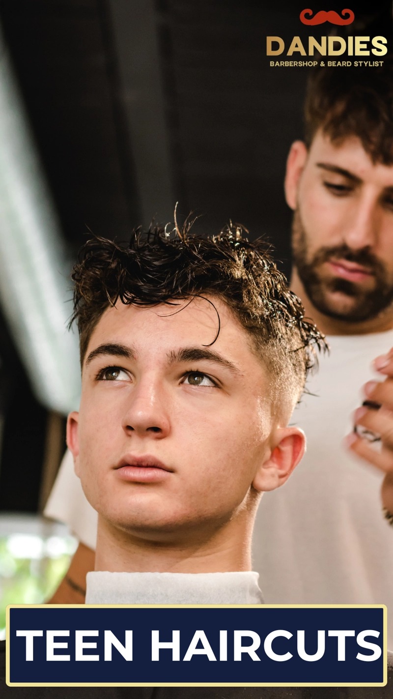 Teen boy getting a clean fade haircut at Dandies Barbershop in Campbell