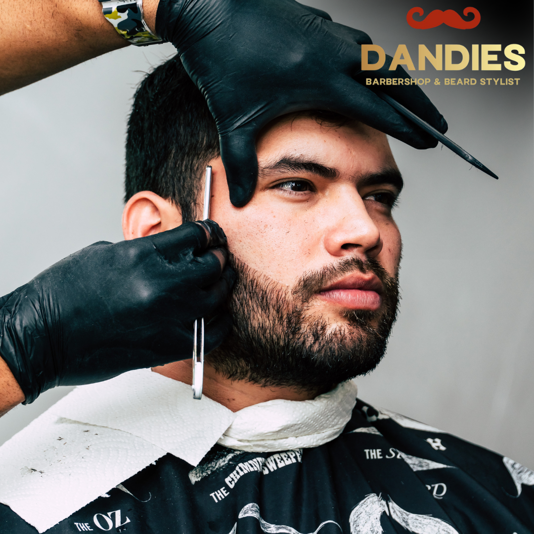 Baby getting a haircut at Dandies Barber in Campbell