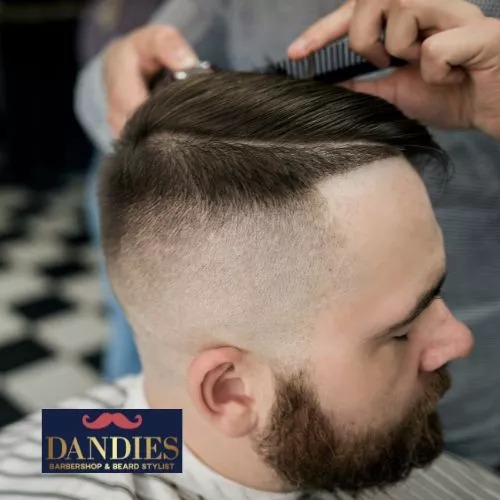 Friendly kids barber in Campbell giving a haircut